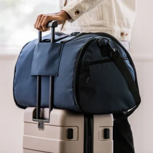 how to travel with a suit garment bag