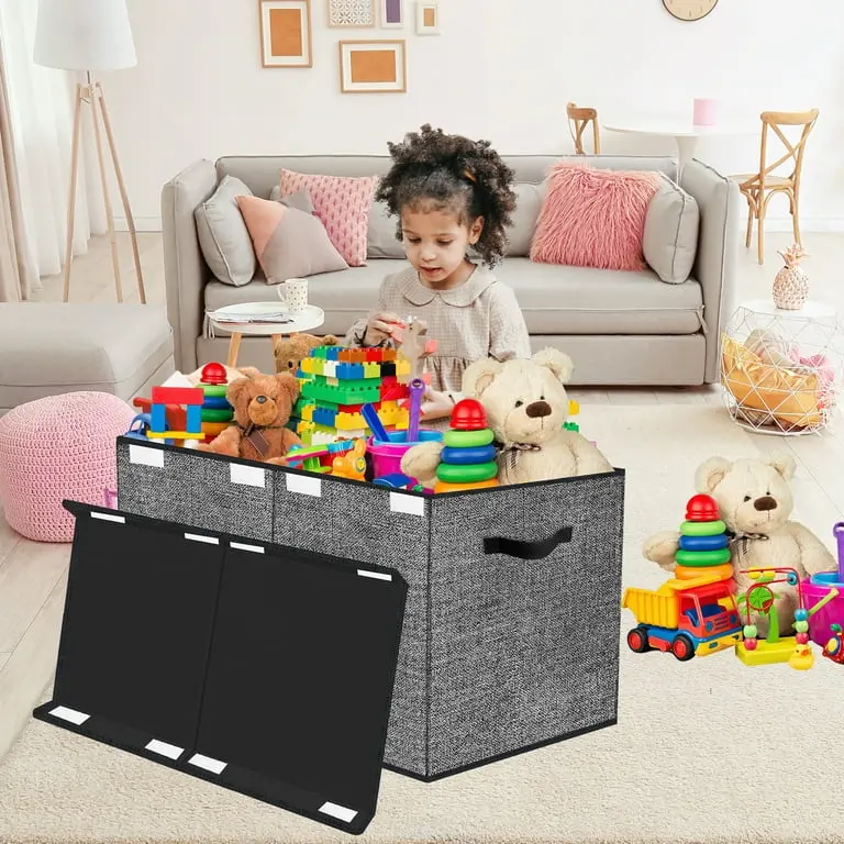 Child using a fabric storage box with soft sides and lid (1)