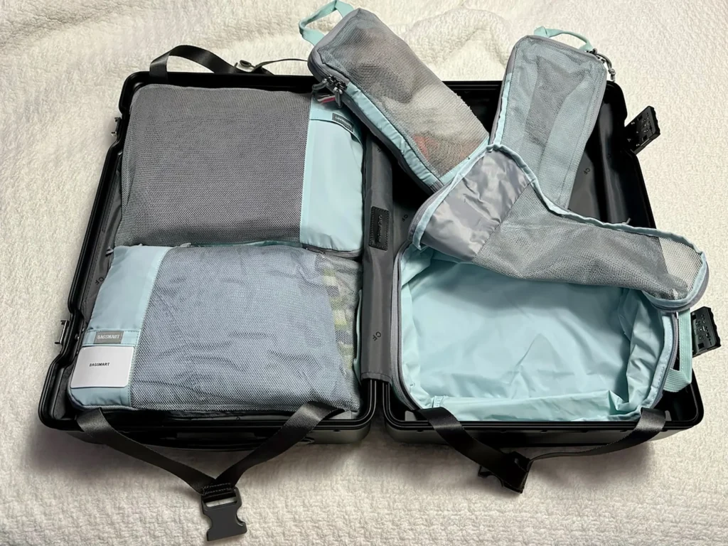 Suitcase packed with packing cubes