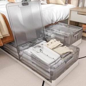 Under-bed storage boxes filled with neatly folded clothes.