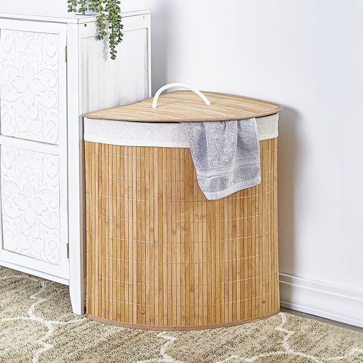 best place to put laundry hamper in bedroom
