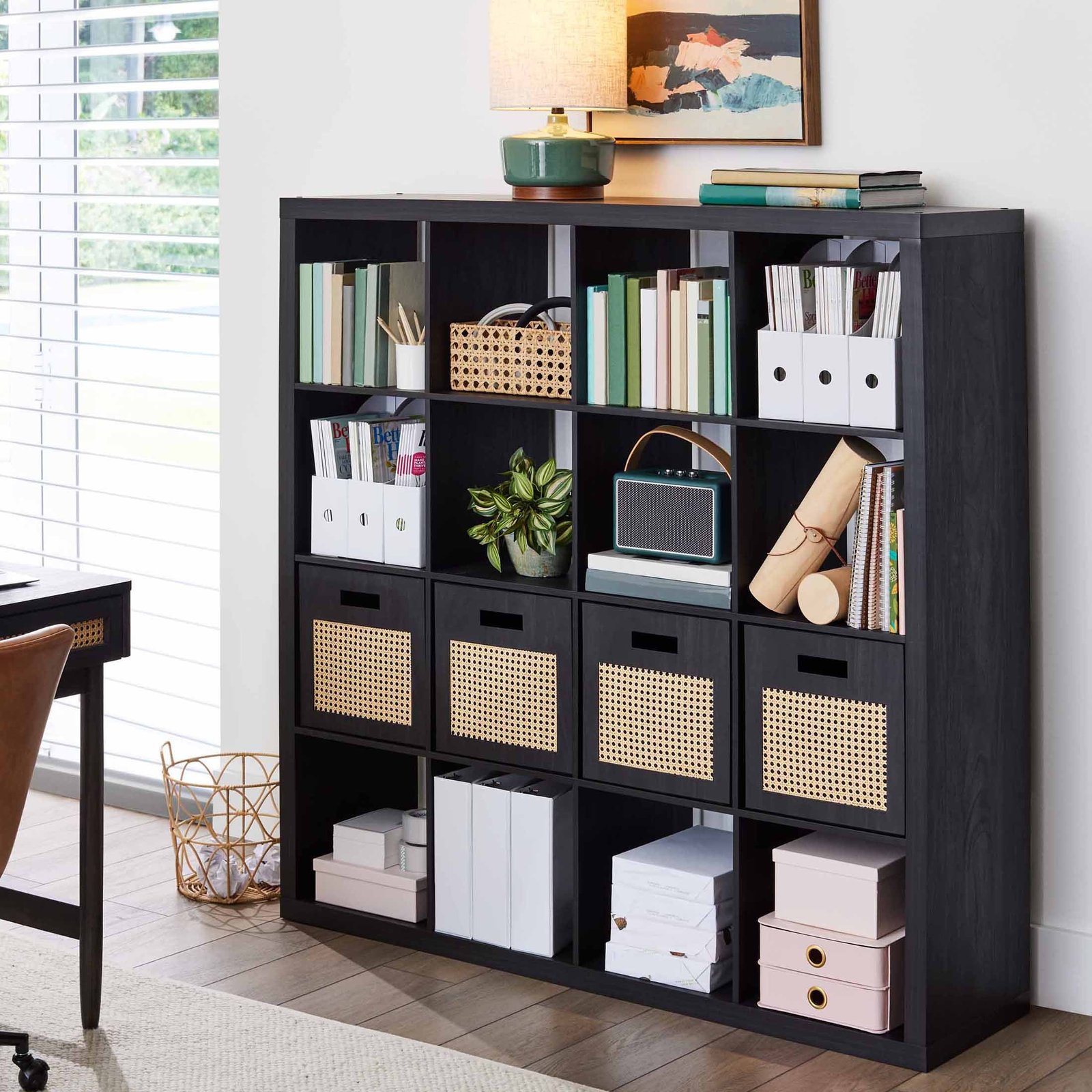 Better Home and Garden cube storage unit styled as a TV console with books and baskets.