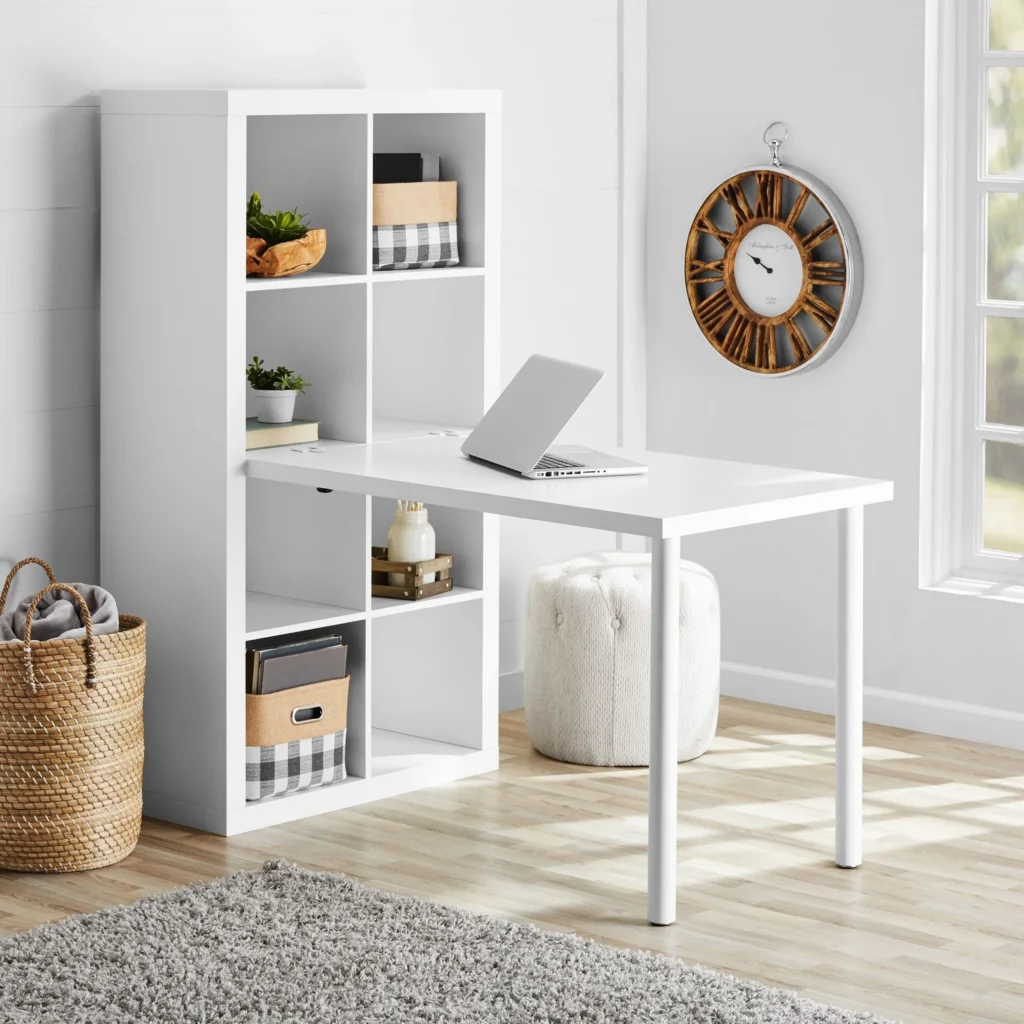Home office corner with Better Home and Garden cube shelves holding files, bins, and plants.
