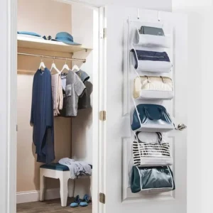 Over-the-door handbag organizer with transparent pockets storing purses.
