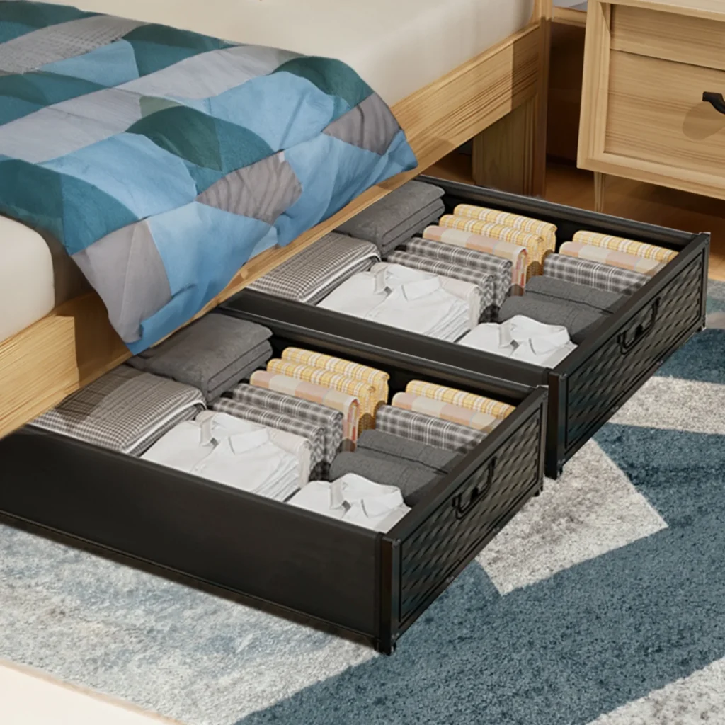 Under-bed drawers storing clothing in a compact tiny home bedroom