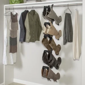 everal pairs of boots clipped and hanging neatly from a closet
