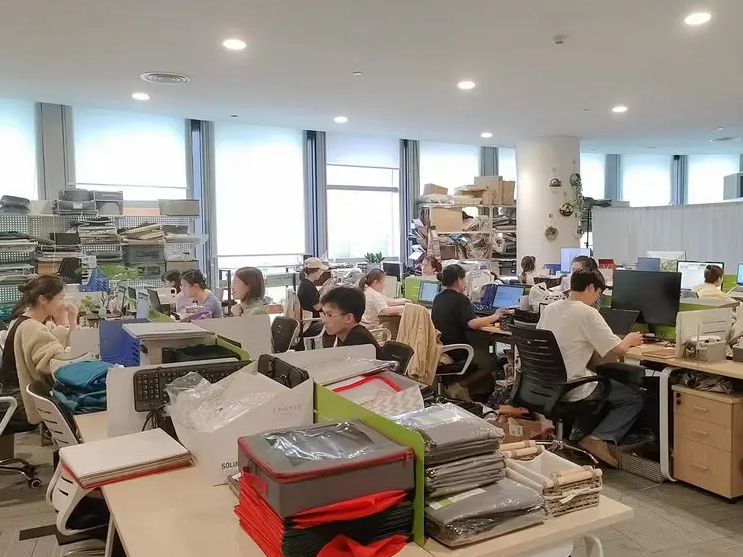 Great Shine office team working on home storage product orders