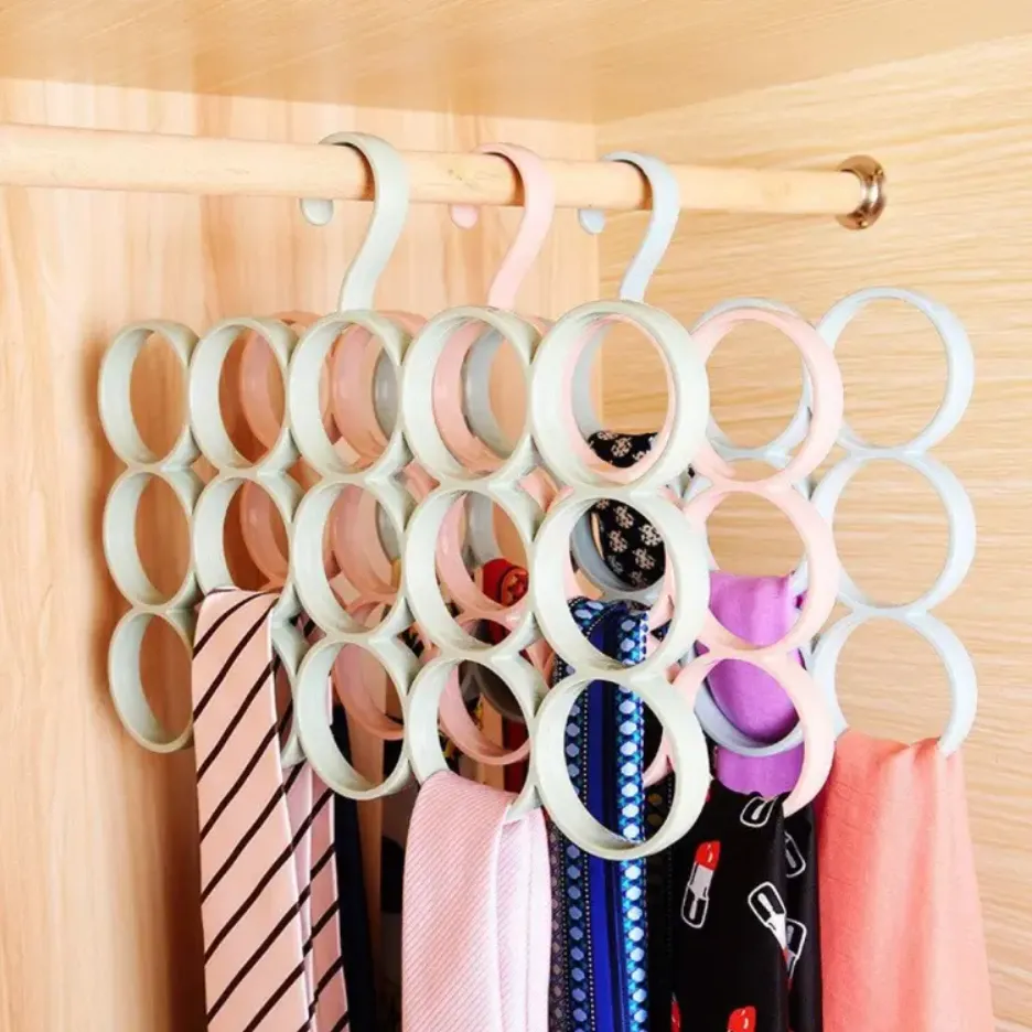 Closet scarf organizer hanger with multiple rings holding colorful scarves