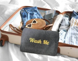 Dual-compartment travel laundry bag separating clean and dirty clothes