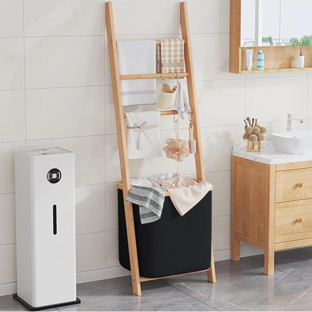 Freestanding bathroom ladder shelf with towels and storage baskets