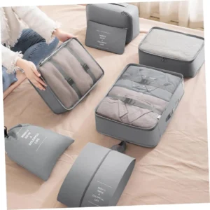 Oxford fabric travel organizer bag packed with clothes for storage