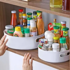 Rotating kitchen storage rack under sink organizing cleaning supplies