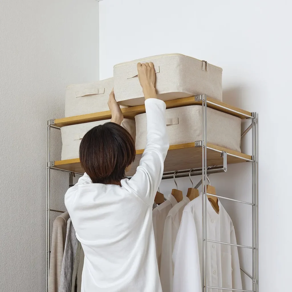 Twill fabric storage boxes used for organizing clothes and accessories in closet