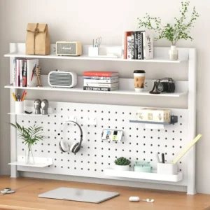Wall-mounted shelf above desk serving as desktop storage rack alternative