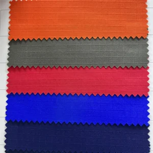 Nylon, polyester, and cotton ripstop fabric swatches with grid patterns