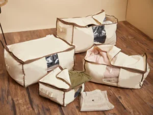 Various types of blanket storage bags including underbed, cube, and canvas styles