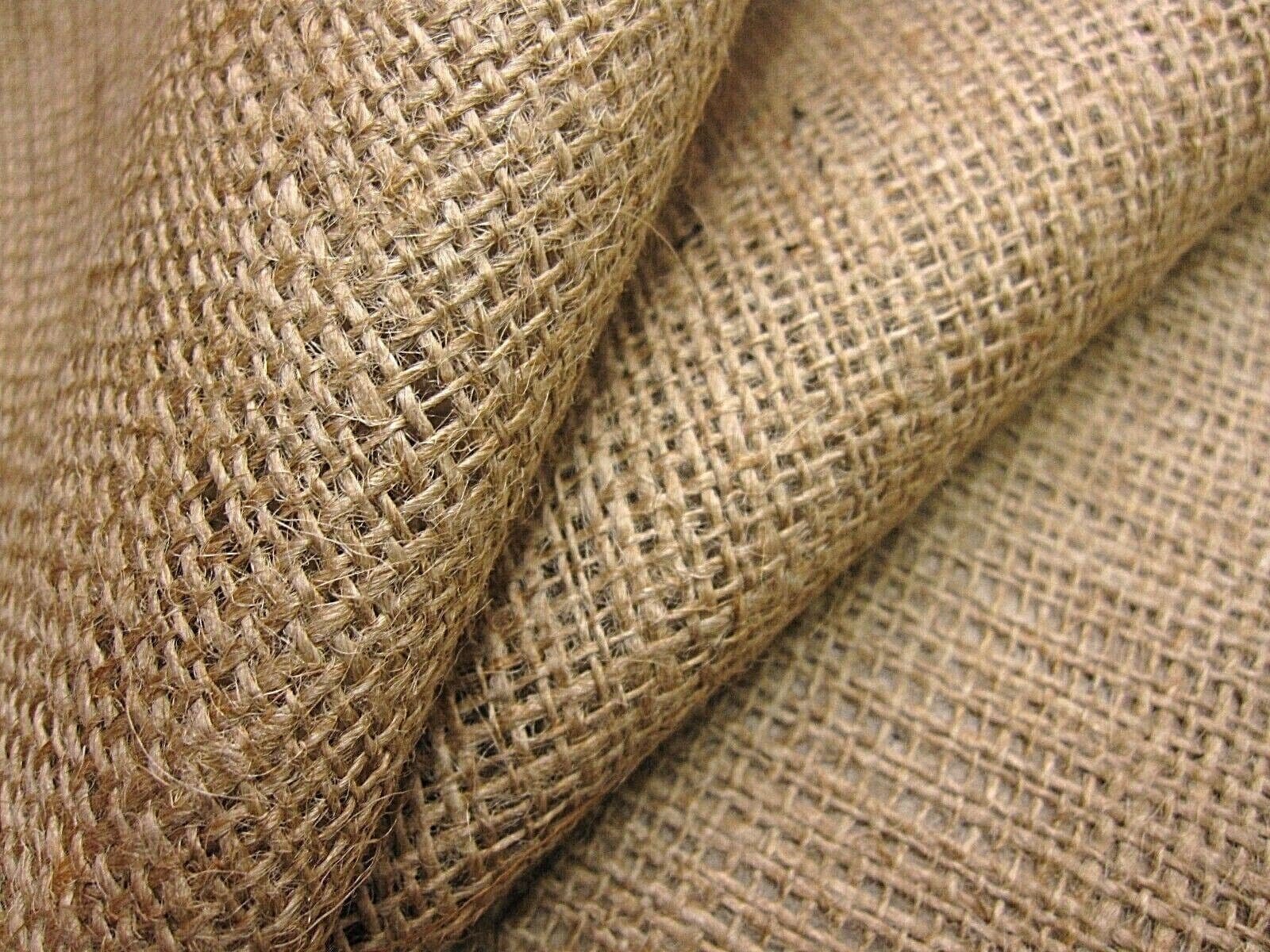 Swatches of natural fabrics including cotton, linen, silk, and wool